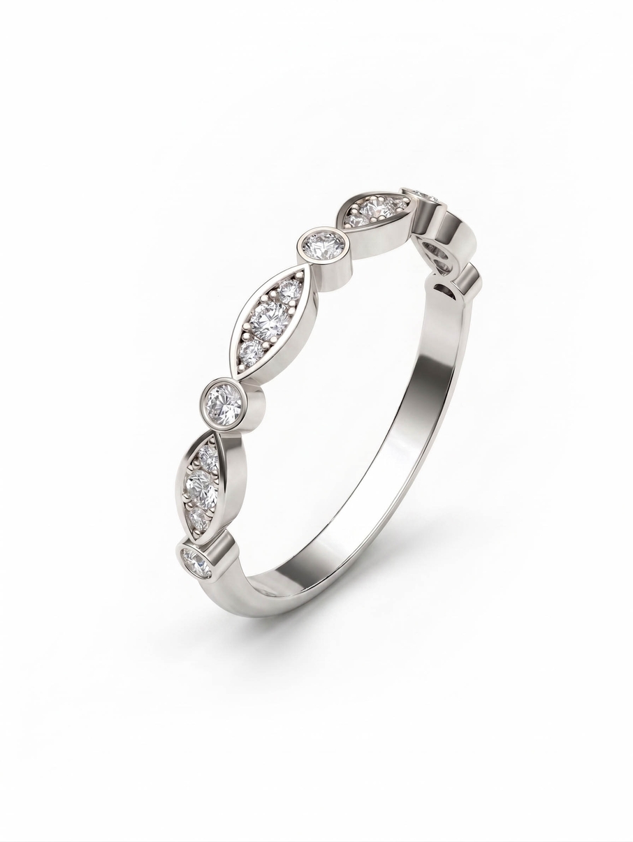 Dámský elegantní prsten z bílého zlata zdobený kulatými a oválnými diamanty