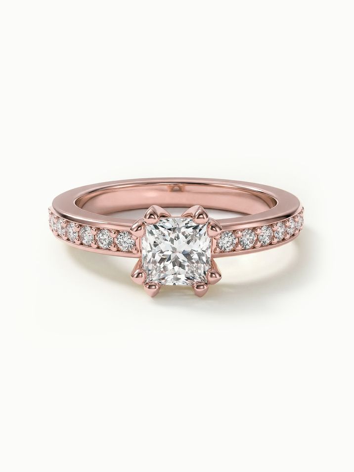 Zásnubní prsten s centrálním diamantem v červeném zlatě