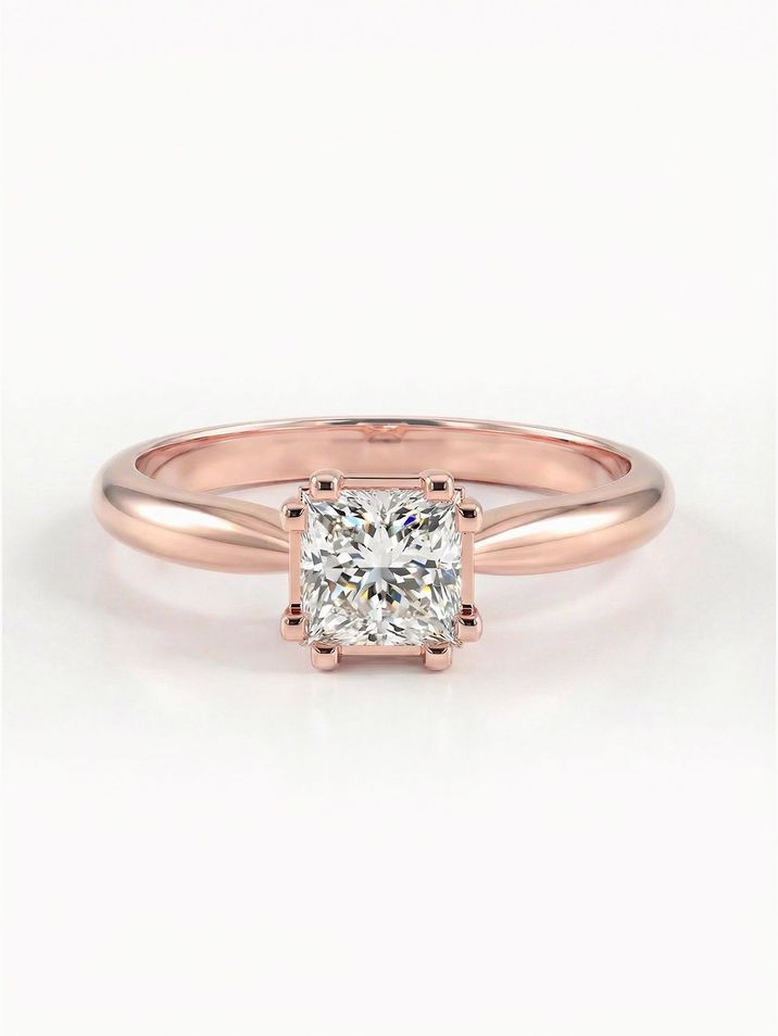 Elegant rose gold engagement ring with a square princess-cut stone and a smooth band