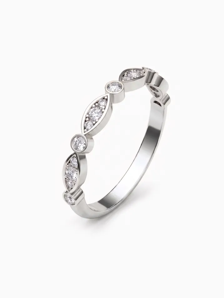 Dámský elegantní prsten z bílého zlata zdobený kulatými diamanty