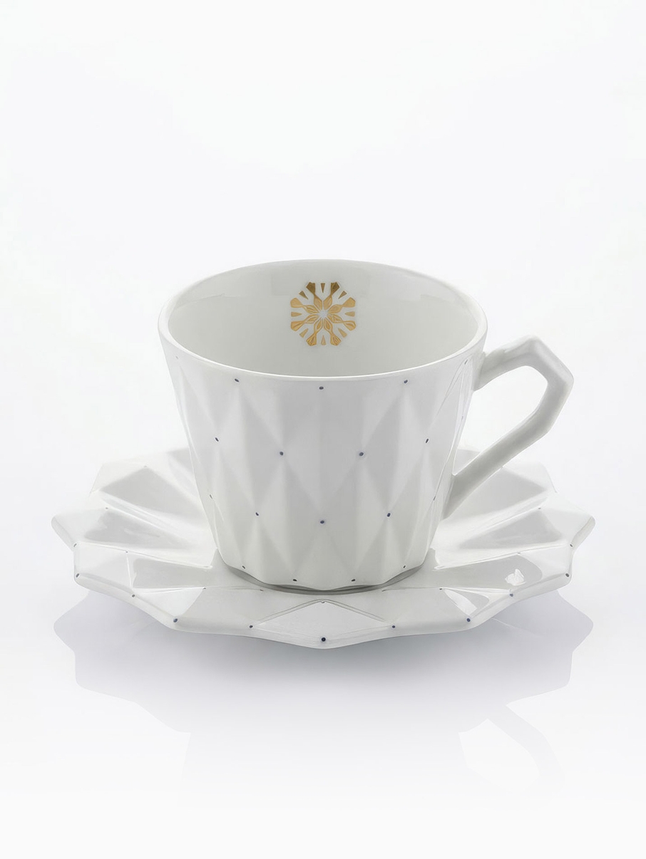 Porcelánový šálek s podšálkem Goldfinger