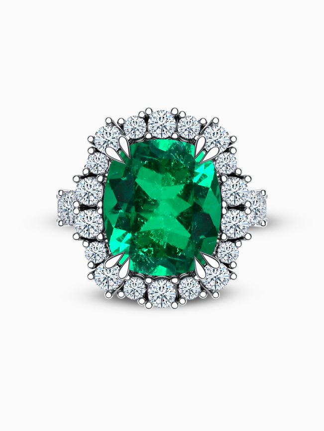 Zlatý prsteň s kolumbijským smaragdom osadený diamantmi