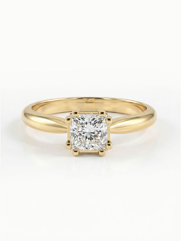 Elegant yellow gold engagement ring with a square princess-cut stone and a smooth band