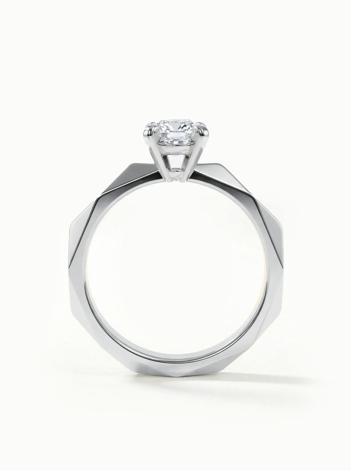 Unconventional white gold engagement ring with a 4.5 mm centre stone and a distinctive design