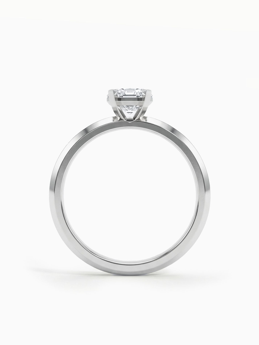 White gold engagement ring with a 4.5 mm stone, notable for its clean setting and captivating design