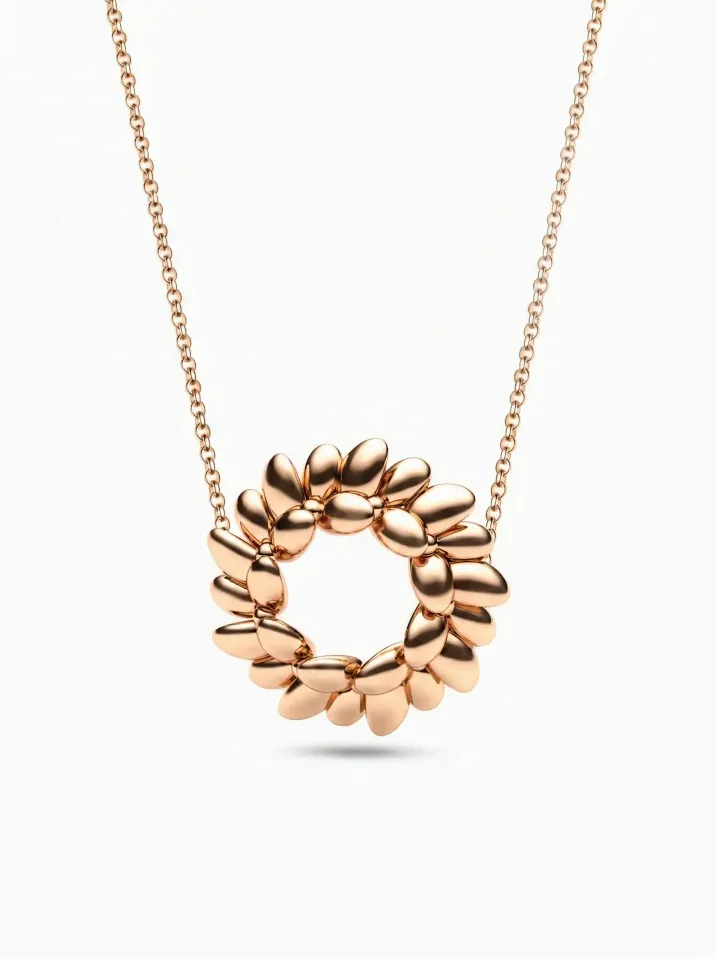 Náhrdelník z červeného zlata zdobený motívom vavrínového listu z kolekcie Vavríny KORBIČKA