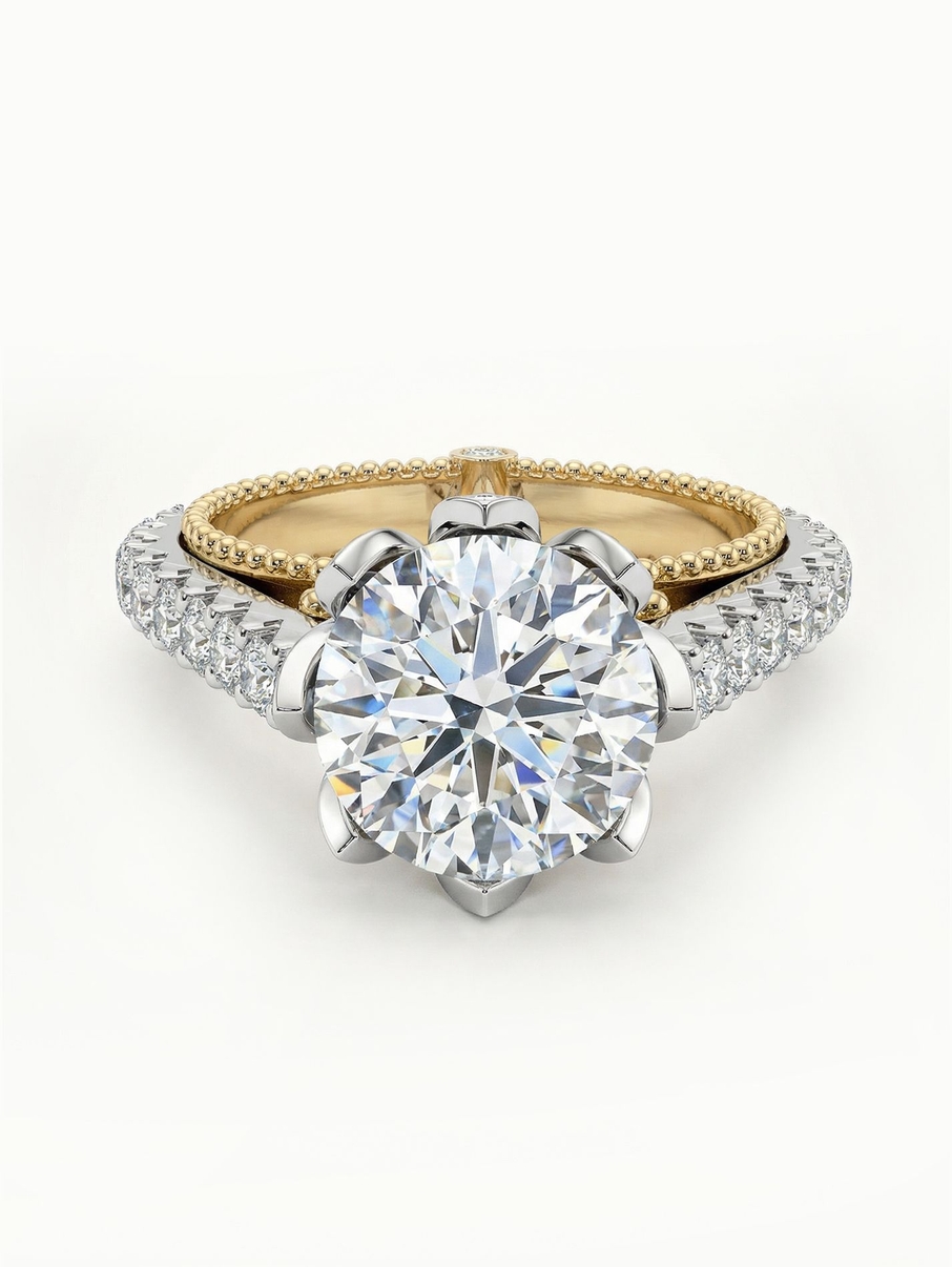 Gold engagement ring with a two-tone band, filigree and a set crown in a unique design