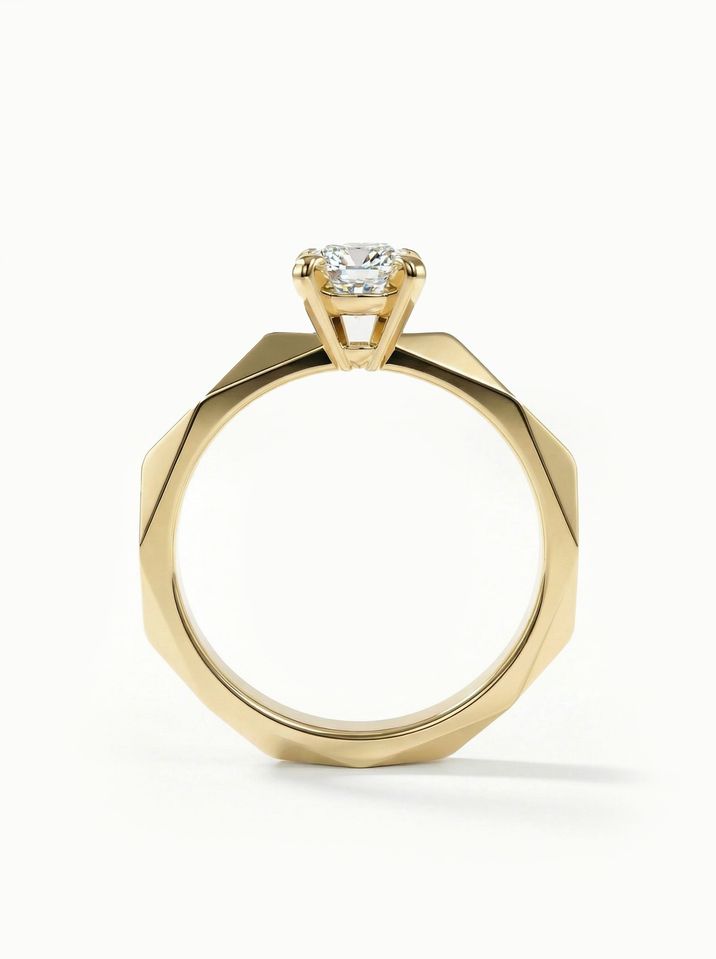 Unconventional yellow gold engagement ring with a 4.5 mm centre stone and a distinctive design