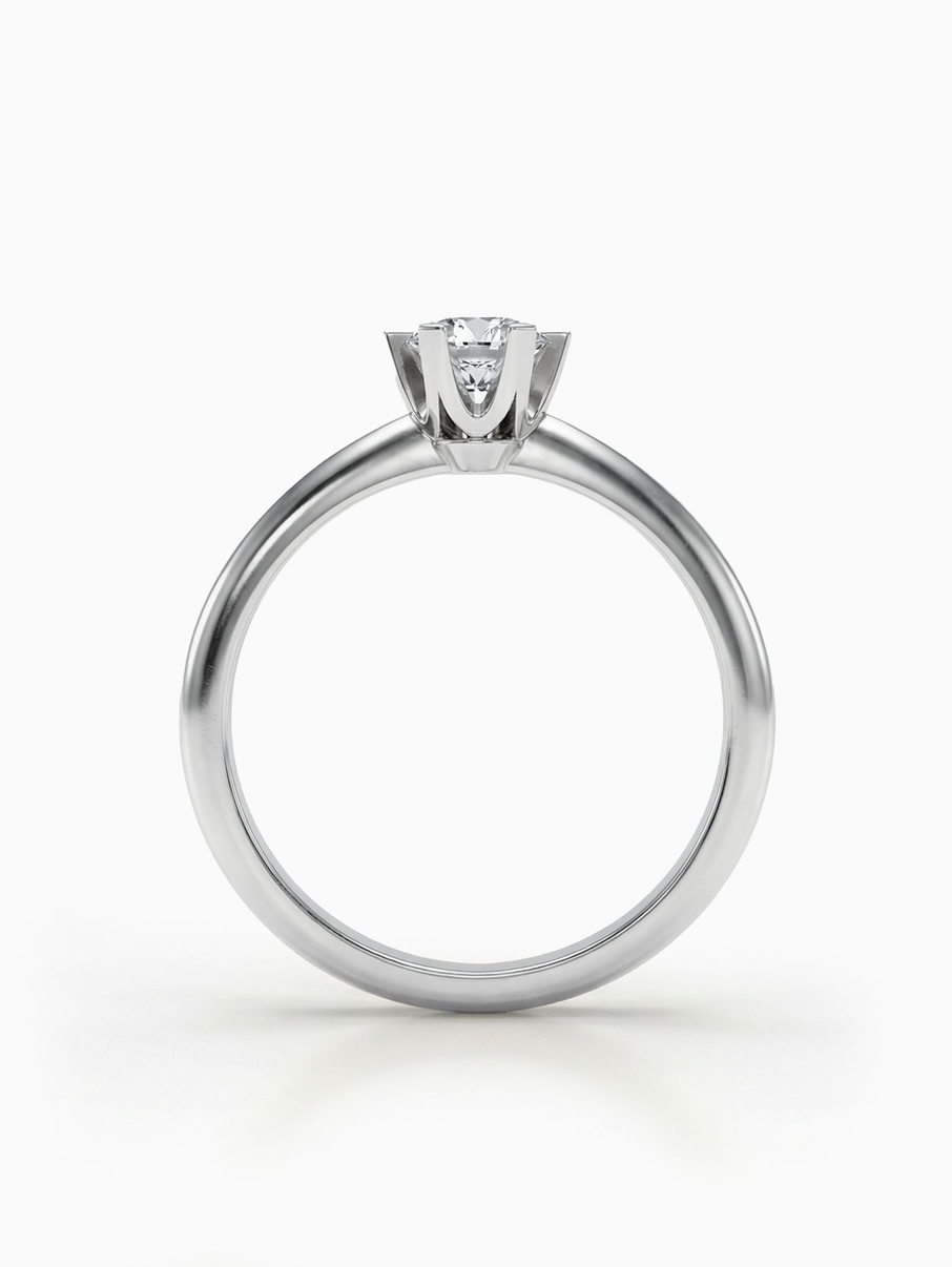 White gold engagement ring with a 4 mm centre stone and a distinctively designed crown