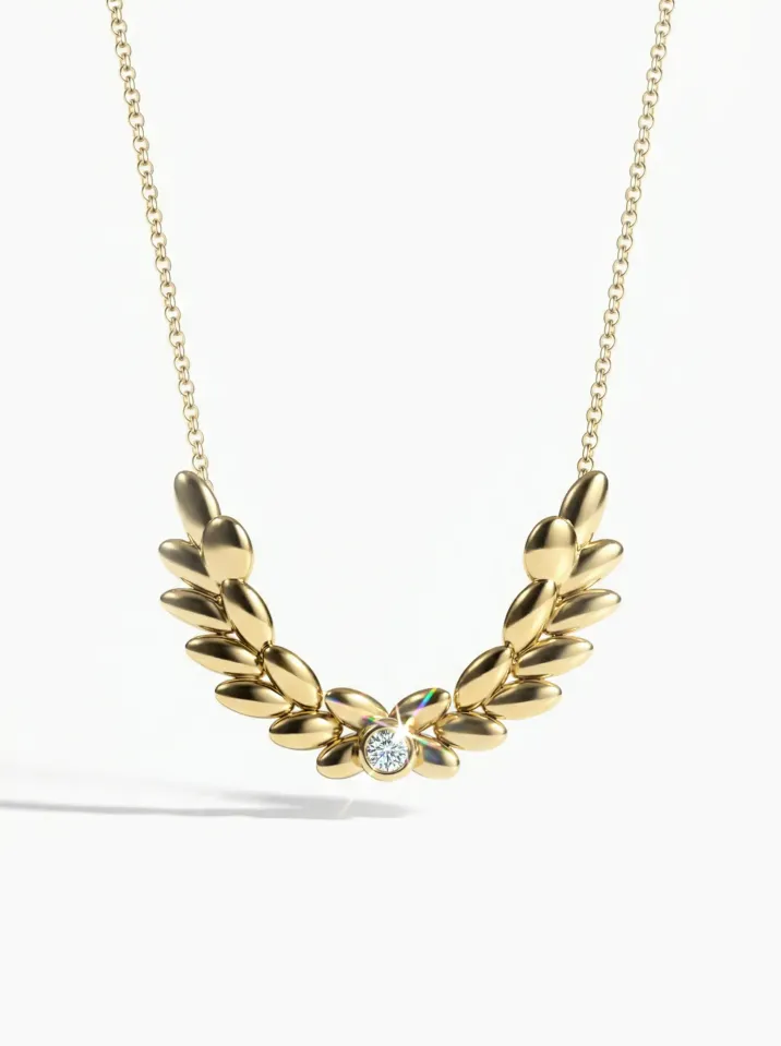 Náhrdelník zo žltého zlata zdobený prírodným diamantom z kolekcie Vavříny KORBIČKA