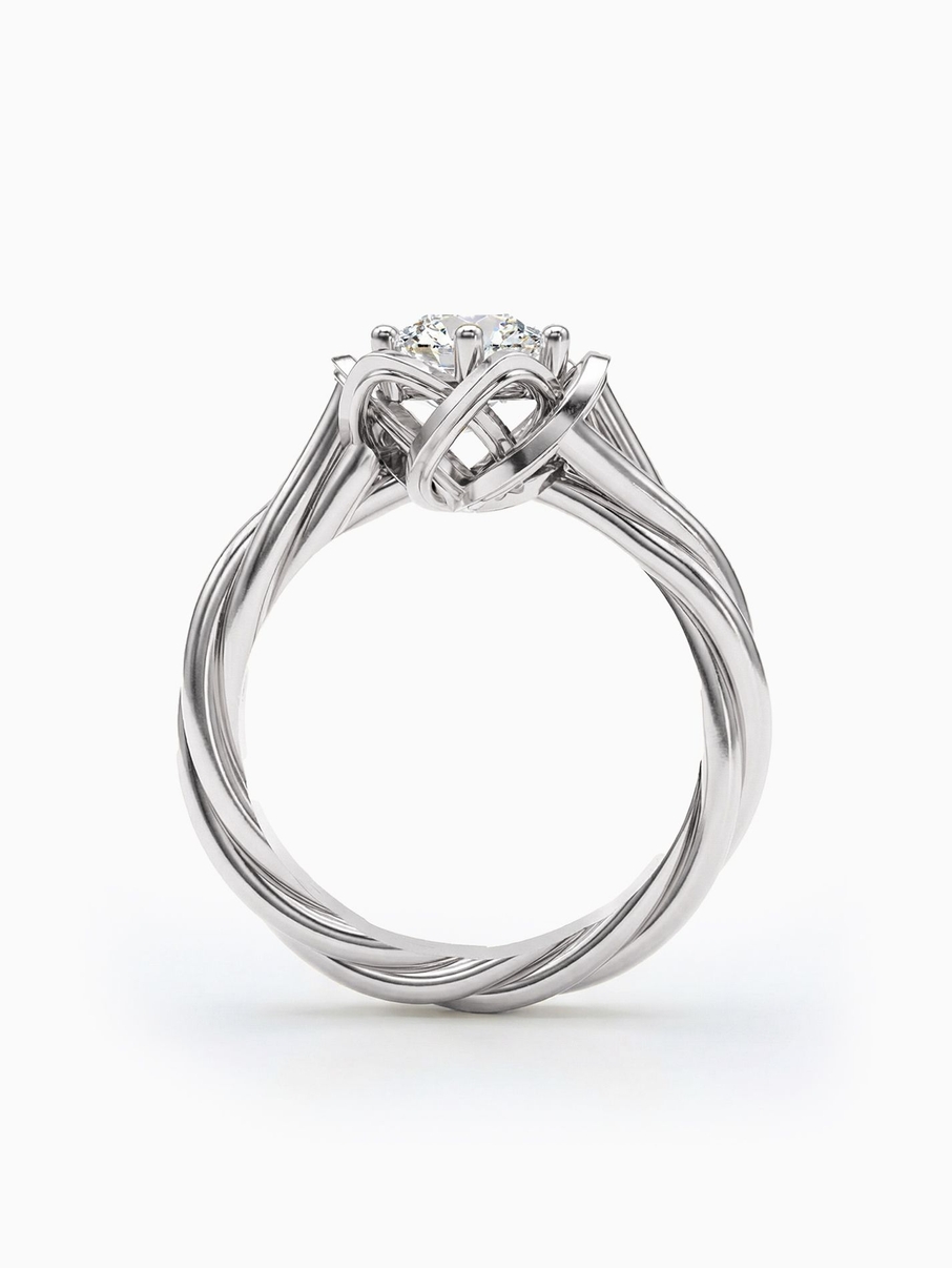 White gold engagement ring with a 5 mm centre stone and an intriguing interwoven design