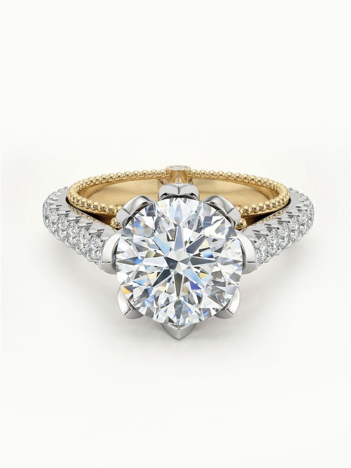Gold engagement ring with a two-tone band, filigree and a set crown in a unique design