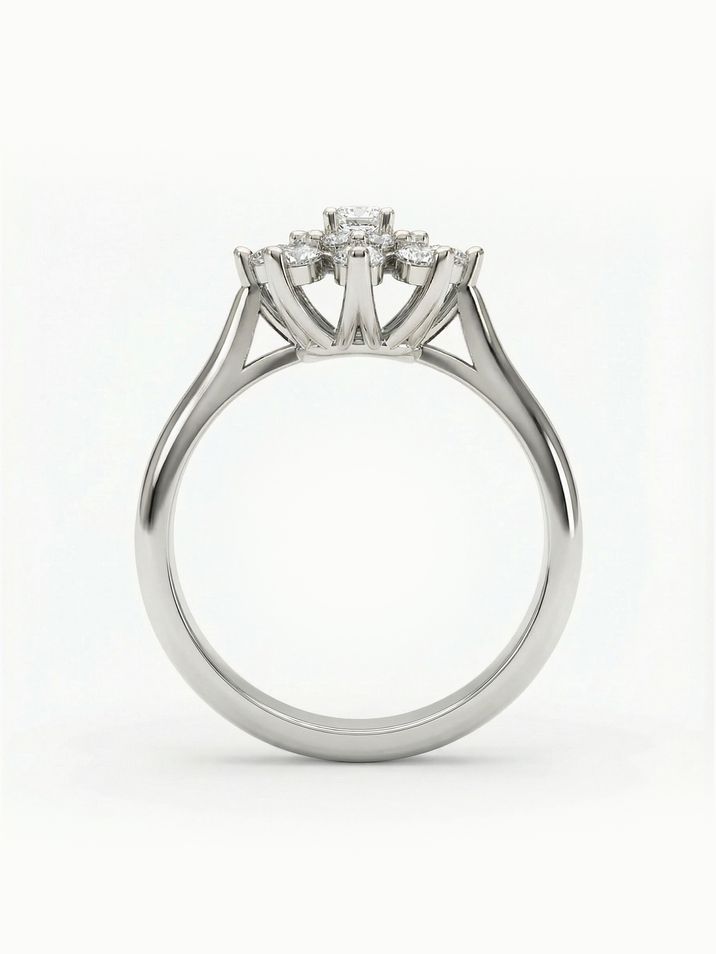 Atypický zásnubní prsten osázený diamanty ve tvaru kytičky v bílém zlatě