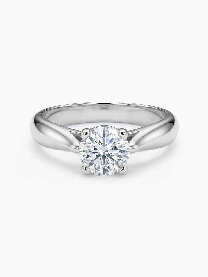 White gold engagement ring with a 5 mm centre stone sparkling in a high crown setting