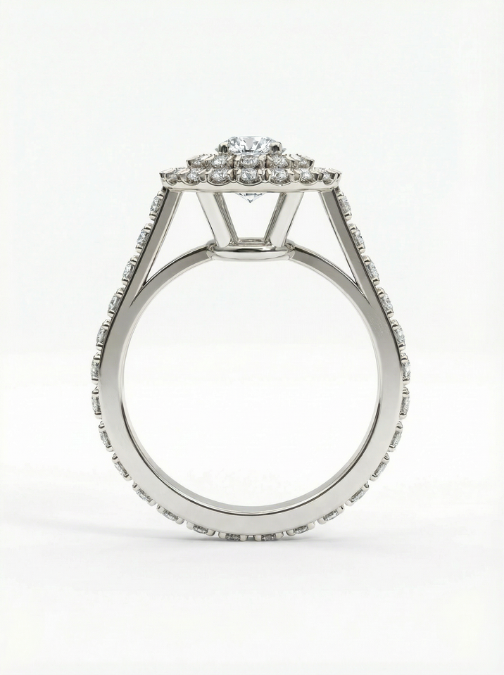 Striking white gold engagement ring with a 4.5 mm centre stone complemented by smaller stones