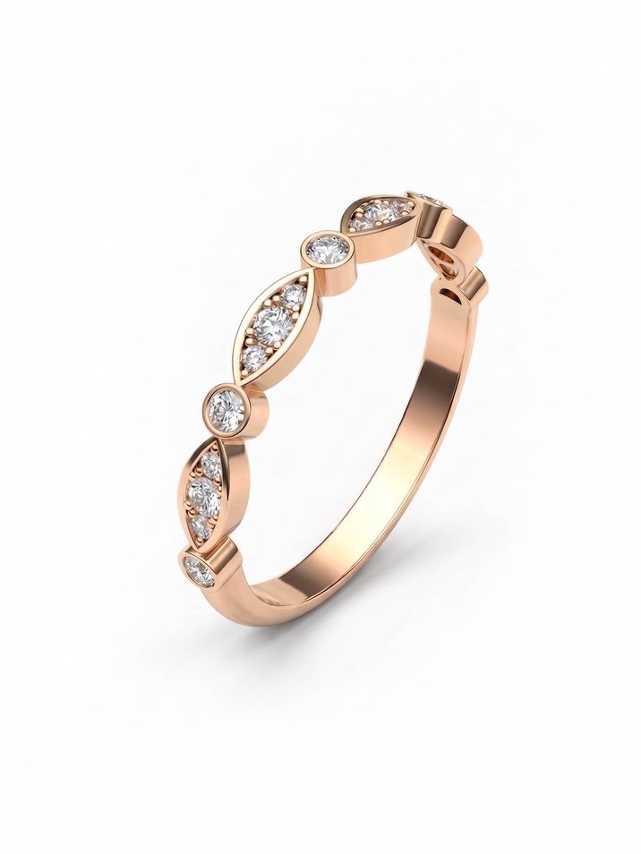 Dámský elegantní prsten z červeného zlata zdobený kulatými a oválnými diamanty