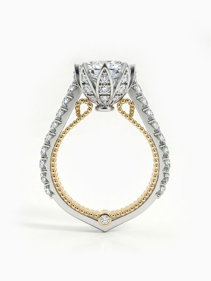 Gold engagement ring with a two-tone band, filigree and a set crown in a unique design